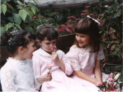 My sister, me, and a cousin at someone's wedding in the early 90s